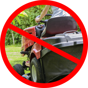 Image depicting a riding lawn mower with a circle-and-slash symbol overtop